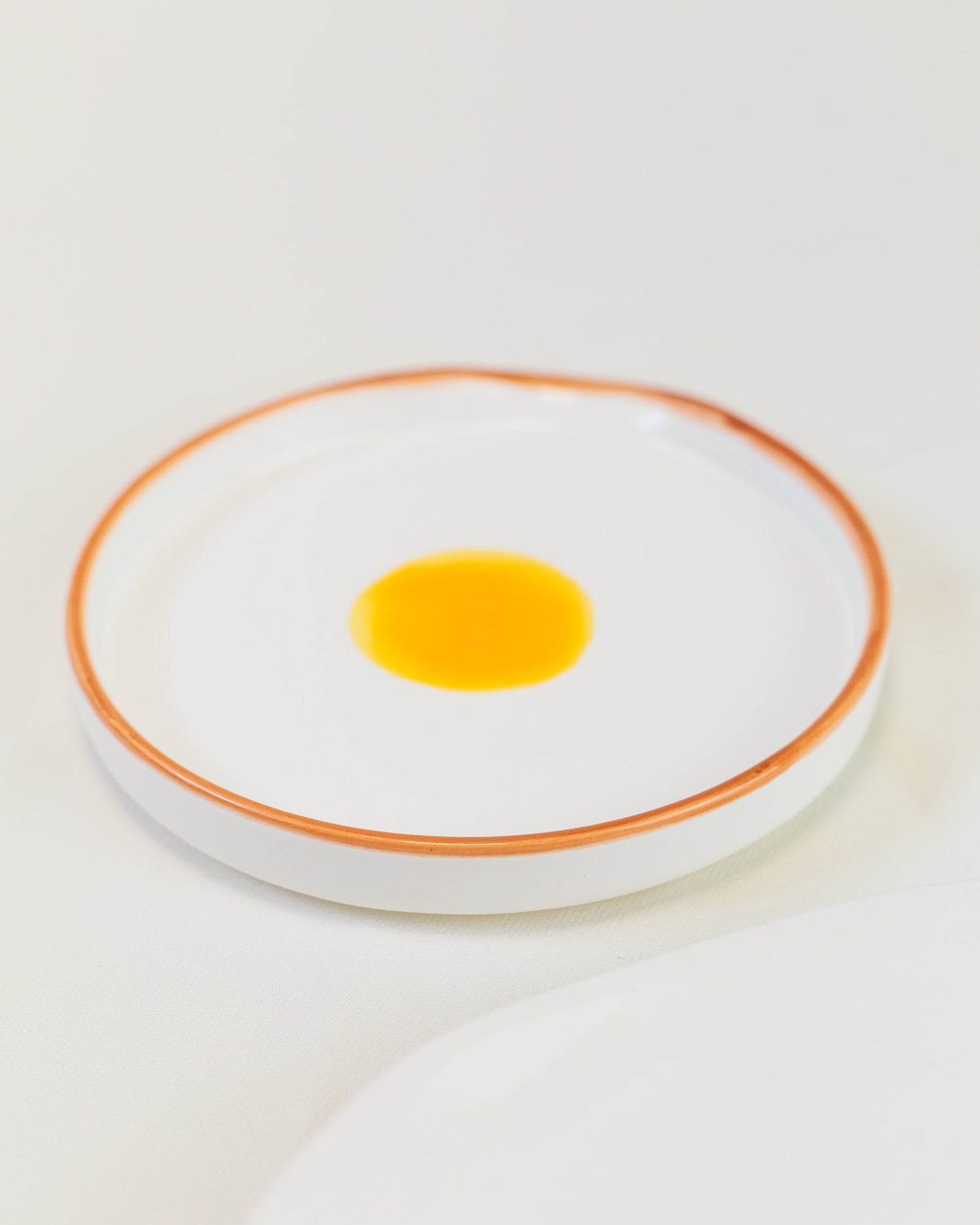 Descanso pra colher ovo em cerâmica