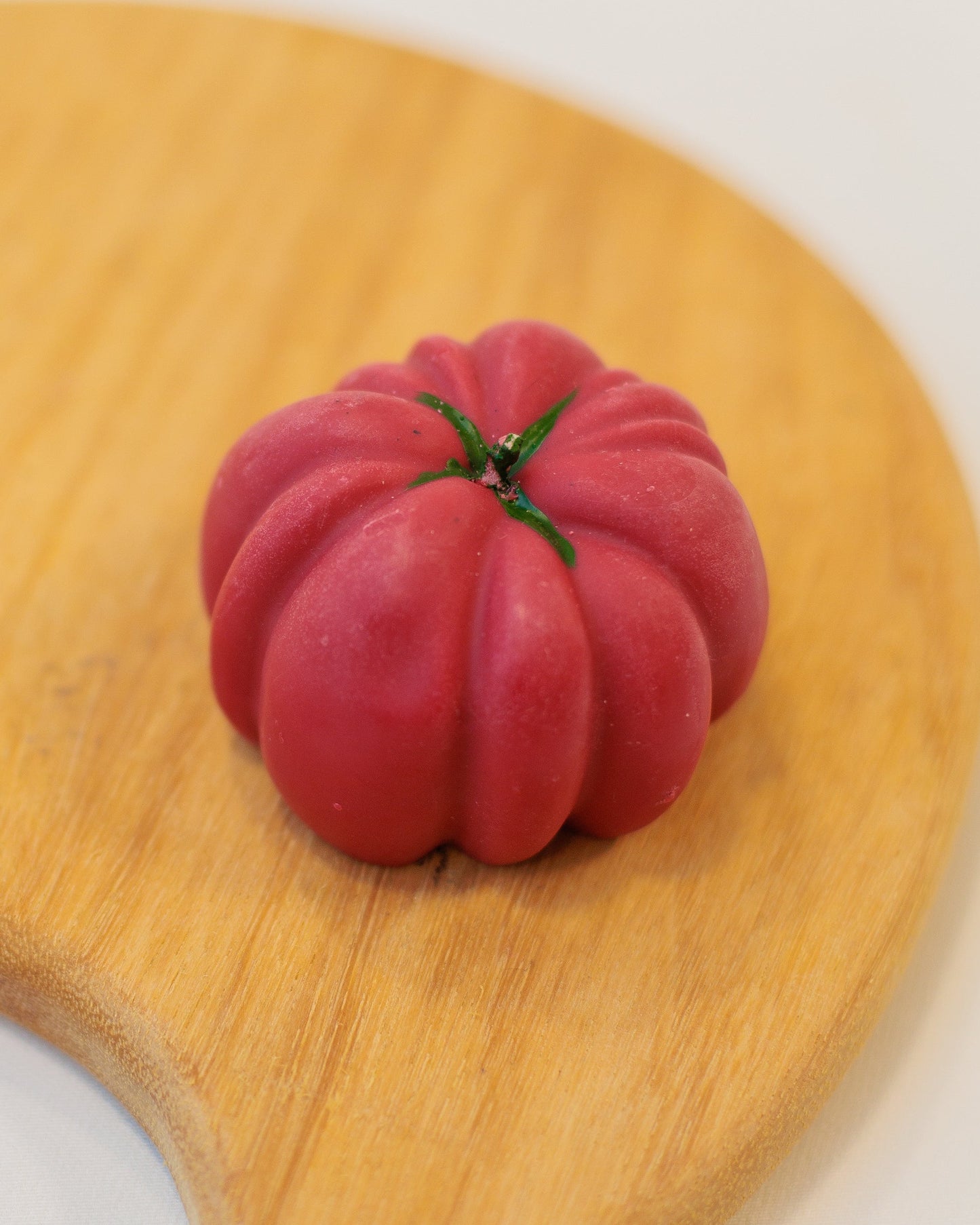 Vela tomate decorativa
